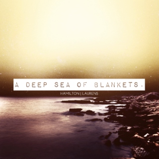 a deep sea of blankets