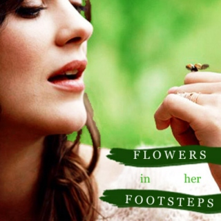 flowers bloom in her footsteps
