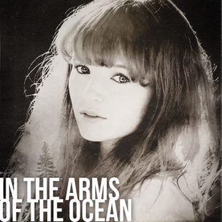 in the arms of the ocean