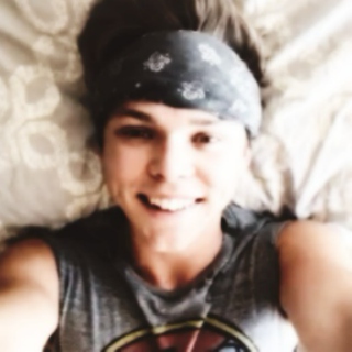 laying in bed with ashton