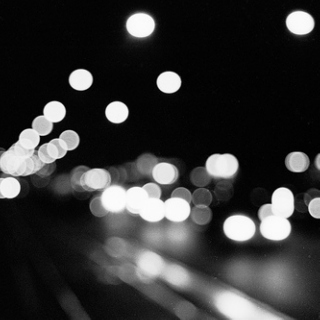 Driving alone at night.