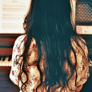 a woman and a piano