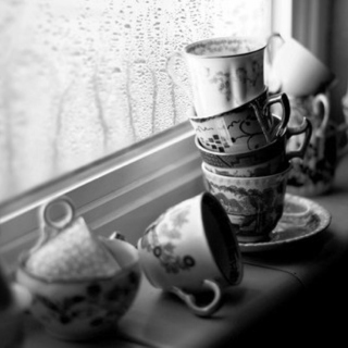 It's raining outside and I have tea