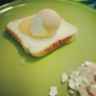 Broken egg on my toast