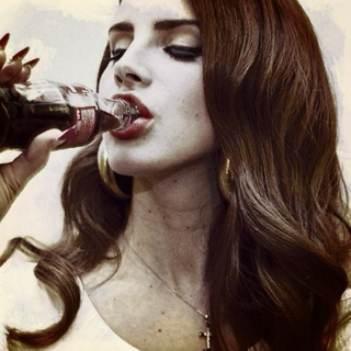 Wraps Her Lips 'Round A Mexican Coke, Makes You Wish That You Were The Bottle.