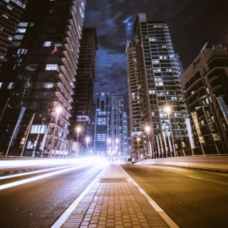Driving Fast Through A Big City At Night