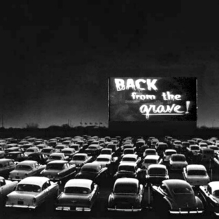 Making out at the drive-in movies.