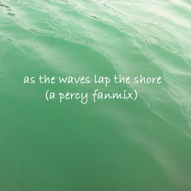 as the waves lap the shore