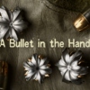 A Bullet in the Hand