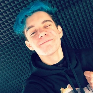 the blue haired boy