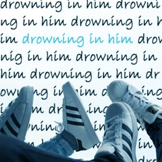 drowning in him.