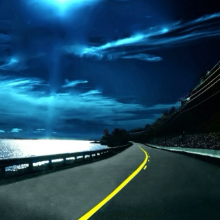 *Moon is on the highway, darkness fills the sky